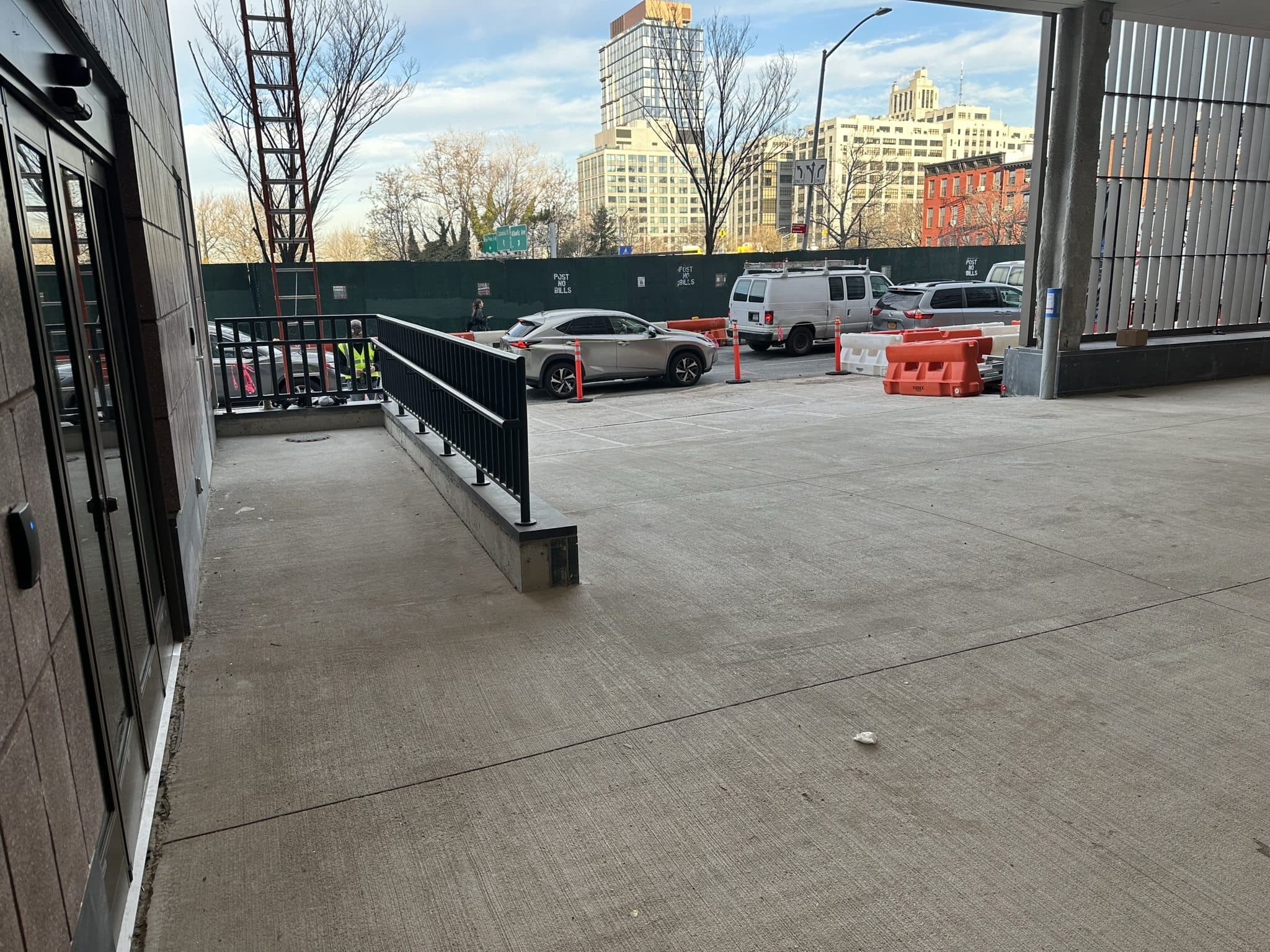 Commercial exterior concrete flatwork beside a building