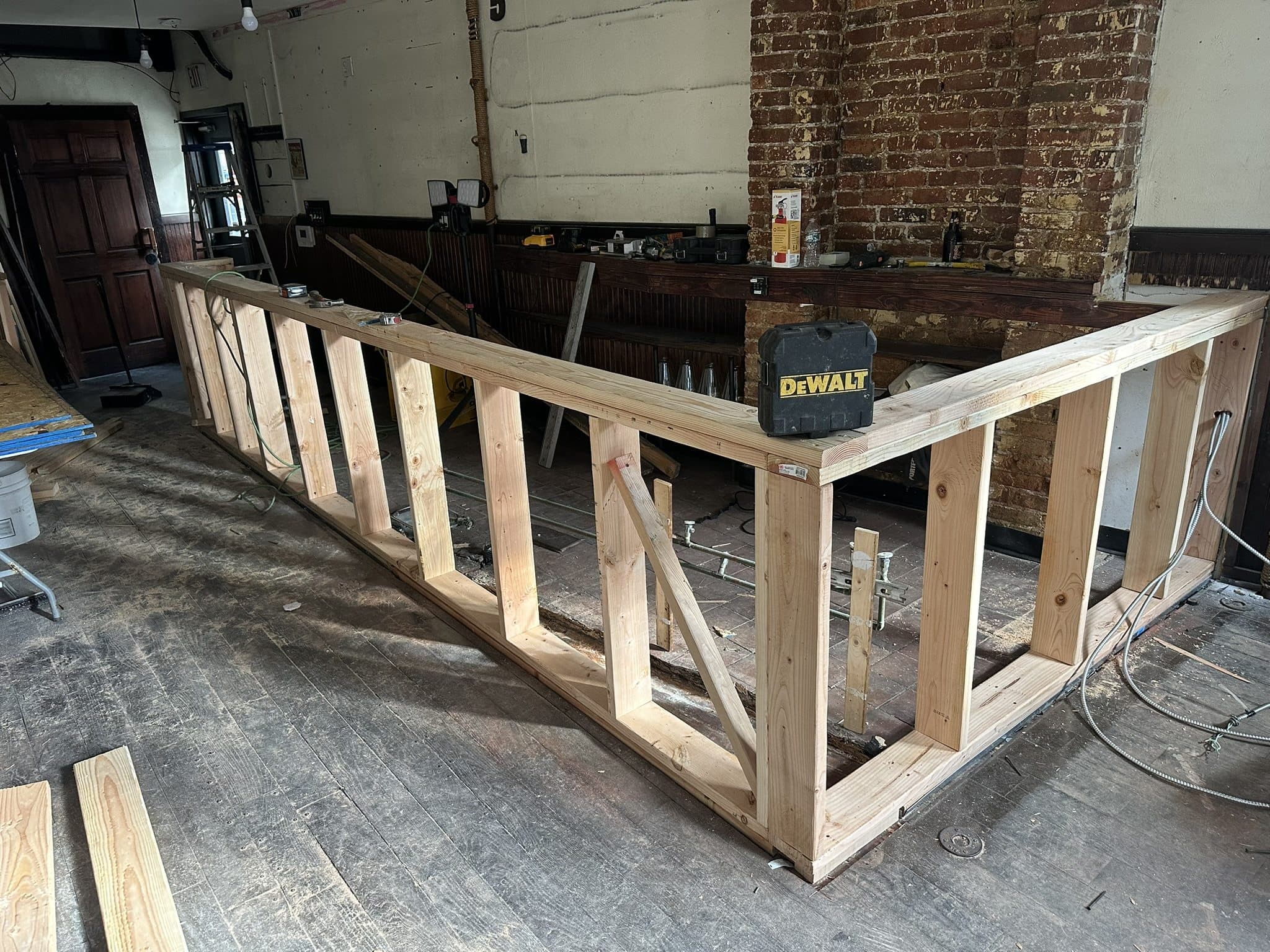 Interior wood framing for a custom finish carpentry feature