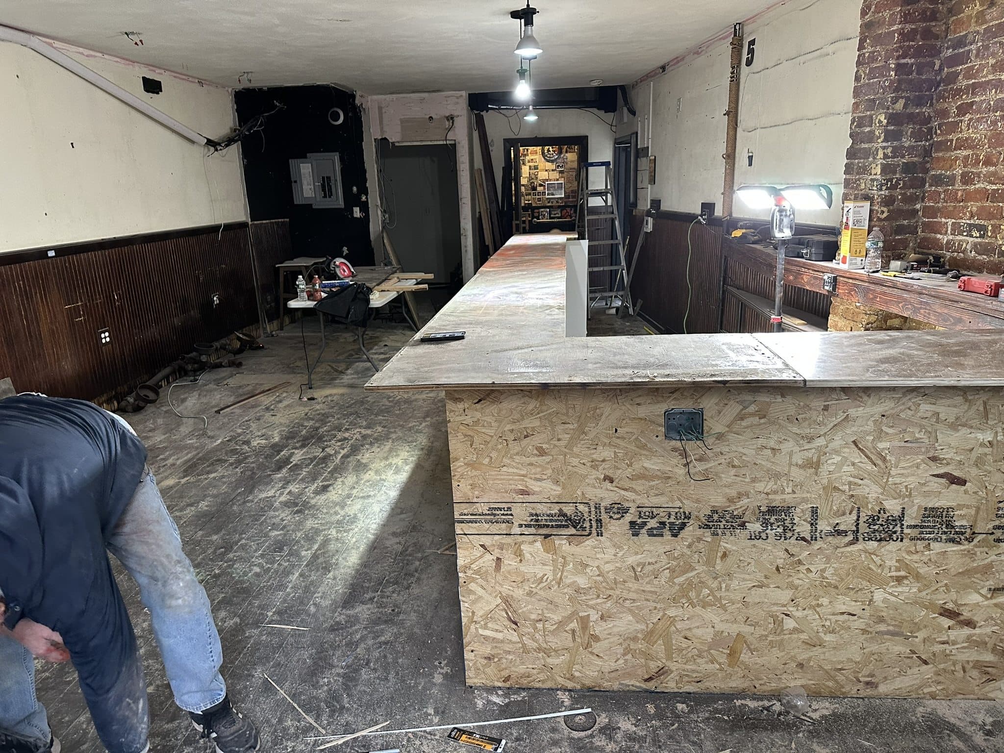 Interior renovation buildout with framing and finish preparation